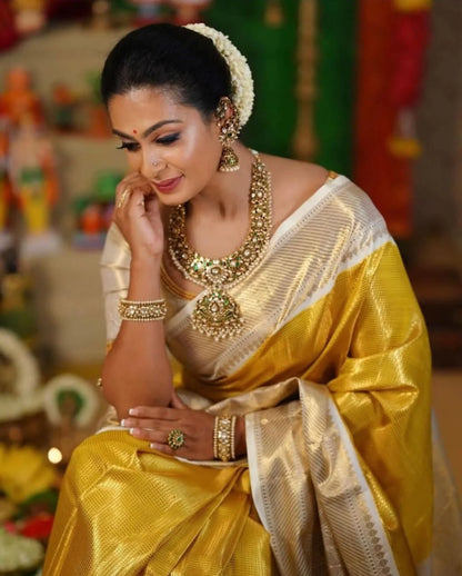 Traditional Yellow Silk Saree with Elegant Golden Zari Weaving