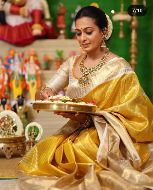 Traditional Yellow Silk Saree with Elegant Golden Zari Weaving