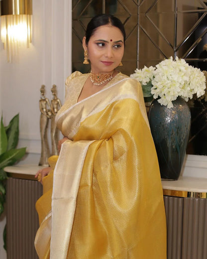 Traditional Yellow Silk Saree with Elegant Golden Zari Weaving