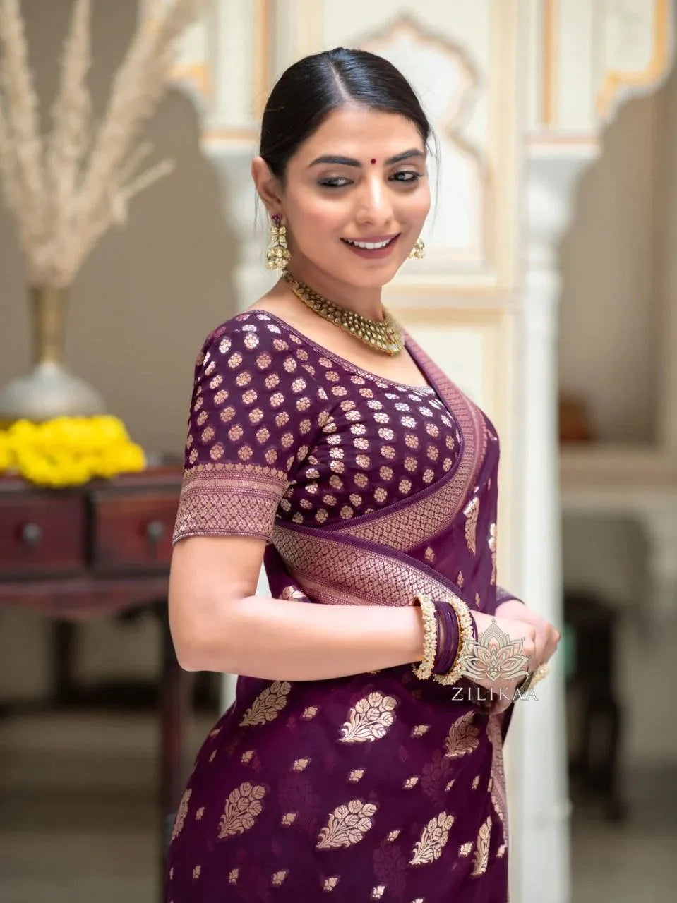 Charming Black Party Wear Saree with Golden Zari Design